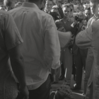 Individuals recording a protest, 1964