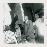 Harold Brown with protesters outside of Bank of America, 1964
